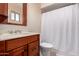 Bathroom showcasing a light-colored vanity, sink, toilet, and a shower at 5037 N 81St St, Scottsdale, AZ 85250