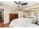 Cozy bedroom with natural light, a dresser, and a mirrored closet for ample storage at 5037 N 81St St, Scottsdale, AZ 85250