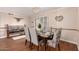 Bright dining room featuring stylish furnishings and hardwood floors at 5037 N 81St St, Scottsdale, AZ 85250