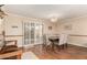 Bright dining area with wood floors, modern furniture, and plenty of natural light at 5037 N 81St St, Scottsdale, AZ 85250