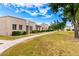 Beautiful townhome exterior featuring a well-maintained lawn and neatly trimmed landscaping at 5037 N 81St St, Scottsdale, AZ 85250
