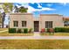 Charming single-story home featuring a stucco exterior, manicured front yard, and cozy patio chairs at 5037 N 81St St, Scottsdale, AZ 85250