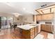 Well-lit kitchen with wood cabinets, sleek countertops, and stainless steel appliances at 5037 N 81St St, Scottsdale, AZ 85250