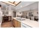 Spacious kitchen with an island and a seamless transition to the dining room at 5037 N 81St St, Scottsdale, AZ 85250