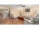 Bright living room with hardwood floors, modern furniture, and a ceiling fan at 5037 N 81St St, Scottsdale, AZ 85250