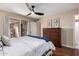 Bright main bedroom with hardwood floors and an exterior door at 5037 N 81St St, Scottsdale, AZ 85250