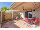 Back patio featuring stone flooring, covered area, string lights, and furniture at 5037 N 81St St, Scottsdale, AZ 85250