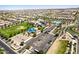 Community aerial showcasing clubhouse, green spaces, parking, and amenities at 5518 S Dillon Cir, Mesa, AZ 85212