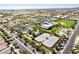 Community aerial view featuring tennis courts, club, parking and green space at 5518 S Dillon Cir, Mesa, AZ 85212