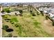 Aerial view of neighborhood green space with landscaping, walking paths, and community amenities at 5518 S Dillon Cir, Mesa, AZ 85212