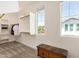 Walk-in closet has a window, a bench, carpet, and built-in hanging and shelf space at 5518 S Dillon Cir, Mesa, AZ 85212