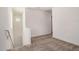 The upstairs loft features neutral carpet, white walls, baseboards, and electrical outlets at 5518 S Dillon Cir, Mesa, AZ 85212