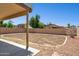 Backyard featuring a blank slate for landscaping and privacy walls at 5553 W Minton Ave, Laveen, AZ 85339