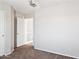 Spacious bedroom with an open door and large closet and carpet at 5553 W Minton Ave, Laveen, AZ 85339