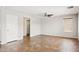 Bright living room featuring tile floors, neutral walls, and a modern ceiling fan at 5553 W Minton Ave, Laveen, AZ 85339
