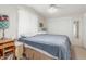 Comfortable bedroom with a serene ambiance, featuring soft lighting and ample closet space at 5735 E Mcdowell Rd # 464, Mesa, AZ 85215