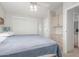 Relaxing bedroom with sliding closet doors, built in cabinets, and ensuite bathroom access at 5735 E Mcdowell Rd # 464, Mesa, AZ 85215