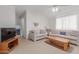 Cozy living room with neutral color palette, comfortable seating, and open floor plan at 5735 E Mcdowell Rd # 464, Mesa, AZ 85215
