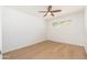 Bright bedroom featuring hardwood floors, white walls, and a window at 6127 N 16Th Pl, Phoenix, AZ 85016