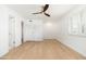 Bedroom with white walls, window shutters, and natural wood floors at 6127 N 16Th Pl, Phoenix, AZ 85016