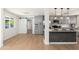 View of the kitchen and adjoining rooms, highlighting the layout and natural light at 6127 N 16Th Pl, Phoenix, AZ 85016