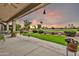 Covered patio with views of the golf course and beautiful sunset at 6141 S Bradshaw Way, Chandler, AZ 85249