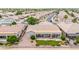 Features a covered patio, well-manicured lawn, and landscaping for a comfortable outdoor living space at 6141 S Bradshaw Way, Chandler, AZ 85249