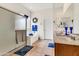 Bright bathroom featuring a soaking tub, glass block window, and separate shower at 6141 S Bradshaw Way, Chandler, AZ 85249