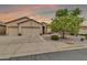 Charming home with a three-car garage, well-kept landscaping, and a welcoming entrance, perfect for families at 6141 S Bradshaw Way, Chandler, AZ 85249