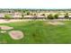 Golf course offering smooth greens, strategic sand traps, and beautiful landscaping for a great game at 6141 S Bradshaw Way, Chandler, AZ 85249