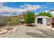 Backyard with a grill, a fire pit and desert landscaping at 711 W El Alba Way, Chandler, AZ 85225