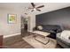 Cozy living room with stylish decor, wood floors, and a ceiling fan at 711 W El Alba Way, Chandler, AZ 85225