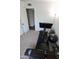 A well-equipped exercise room offering space for a stationary bike, weightlifting and floor exercises at 711 W El Alba Way, Chandler, AZ 85225