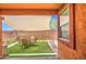 Private outdoor living space with covered patio, artificial grass, and desert views at 7242 S 48Th Gln, Laveen, AZ 85339