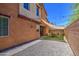 Expansive backyard area with gravel, artificial turf, shade awning, and ample space for outdoor enjoyment at 7242 S 48Th Gln, Laveen, AZ 85339