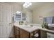 Bathroom featuring dual sinks with framed mirrors and ample cabinet space at 7242 S 48Th Gln, Laveen, AZ 85339