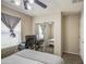 Bedroom showcasing a built-in closet and functional desk space, perfect for study or work at 7242 S 48Th Gln, Laveen, AZ 85339