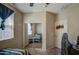 Cozy bedroom features a ceiling fan, large closet with mirrored doors and ample space at 7242 S 48Th Gln, Laveen, AZ 85339
