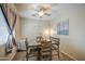 Cozy dining area with a ceiling fan and a view of the backyard at 7242 S 48Th Gln, Laveen, AZ 85339