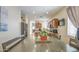 Open-concept dining area adjacent to the kitchen and a table for six at 7242 S 48Th Gln, Laveen, AZ 85339