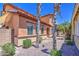 Attractive home exterior with well-manicured landscaping and desert flora at 7242 S 48Th Gln, Laveen, AZ 85339