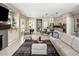 Open-concept living room showcasing kitchen, dining area, and cozy seating with modern finishes at 7492 E Buteo Dr, Scottsdale, AZ 85255