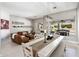 Open-concept living space with a dining room and living room featuring neutral tones at 7492 E Buteo Dr, Scottsdale, AZ 85255