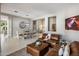 Spacious living area and dining room with neutral tones and modern accents at 7492 E Buteo Dr, Scottsdale, AZ 85255