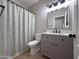 Chic bathroom with a modern vanity, updated fixtures, and a shower featuring neutral tones at 8319 E Plata Ave, Mesa, AZ 85212