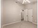 A simple bedroom with a ceiling fan and closet at 8319 E Plata Ave, Mesa, AZ 85212