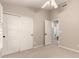 Bedroom with carpeting and a closet that has large sliding doors at 8319 E Plata Ave, Mesa, AZ 85212