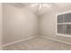 Comfortable bedroom with wall-to-wall carpeting and neutral paint at 8319 E Plata Ave, Mesa, AZ 85212
