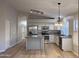 Updated kitchen featuring granite countertops, stainless steel appliances, and a center island at 8319 E Plata Ave, Mesa, AZ 85212