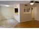 Open-concept living area with hardwood floors, tile and a kitchen bar area at 8702 N Shadow Ln, Peoria, AZ 85345
